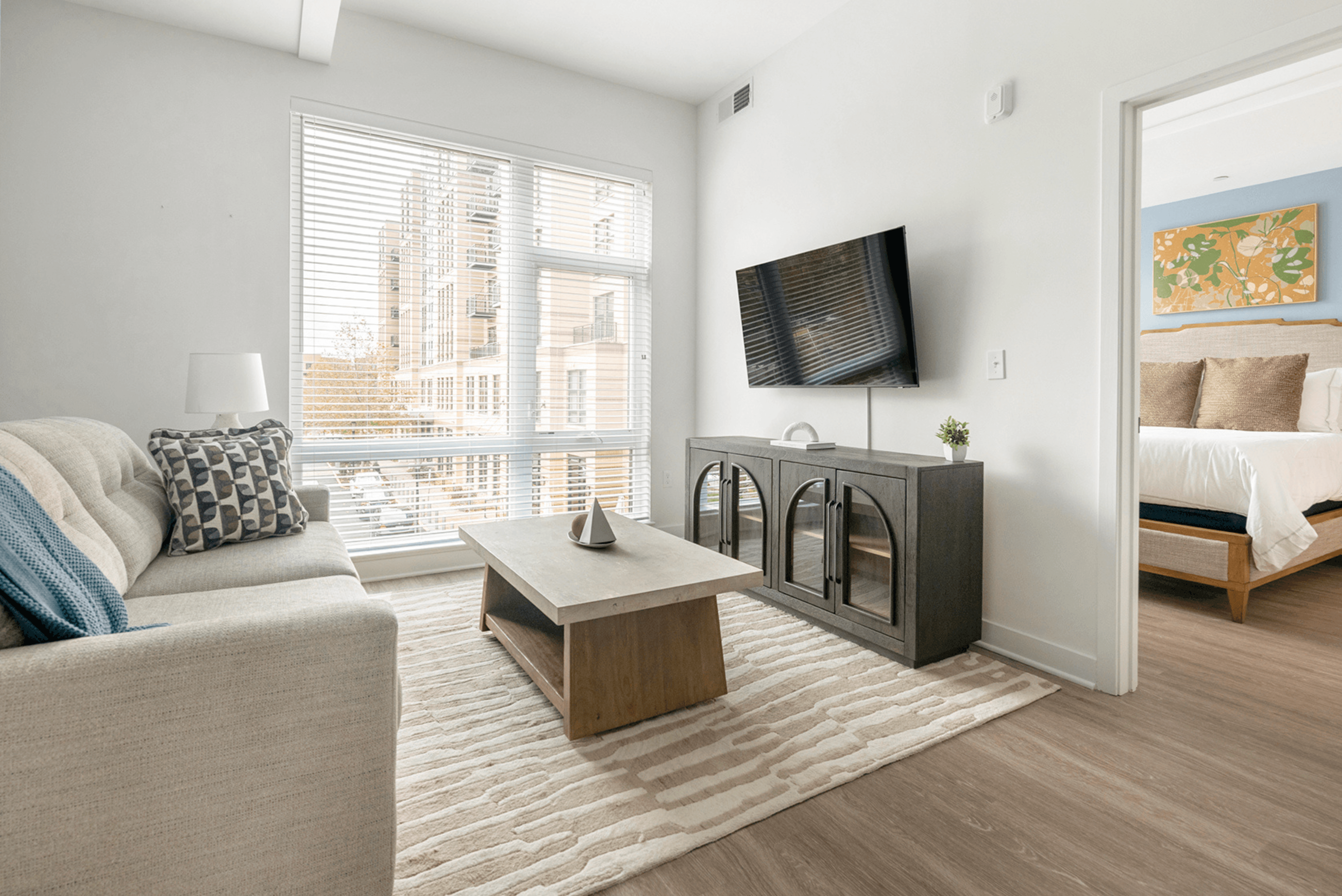 Comfortable Landing apartment living room and bedroom with a city view