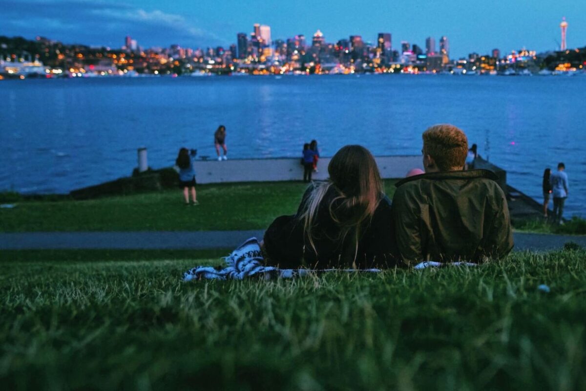 Couple looks over the city of Seattle