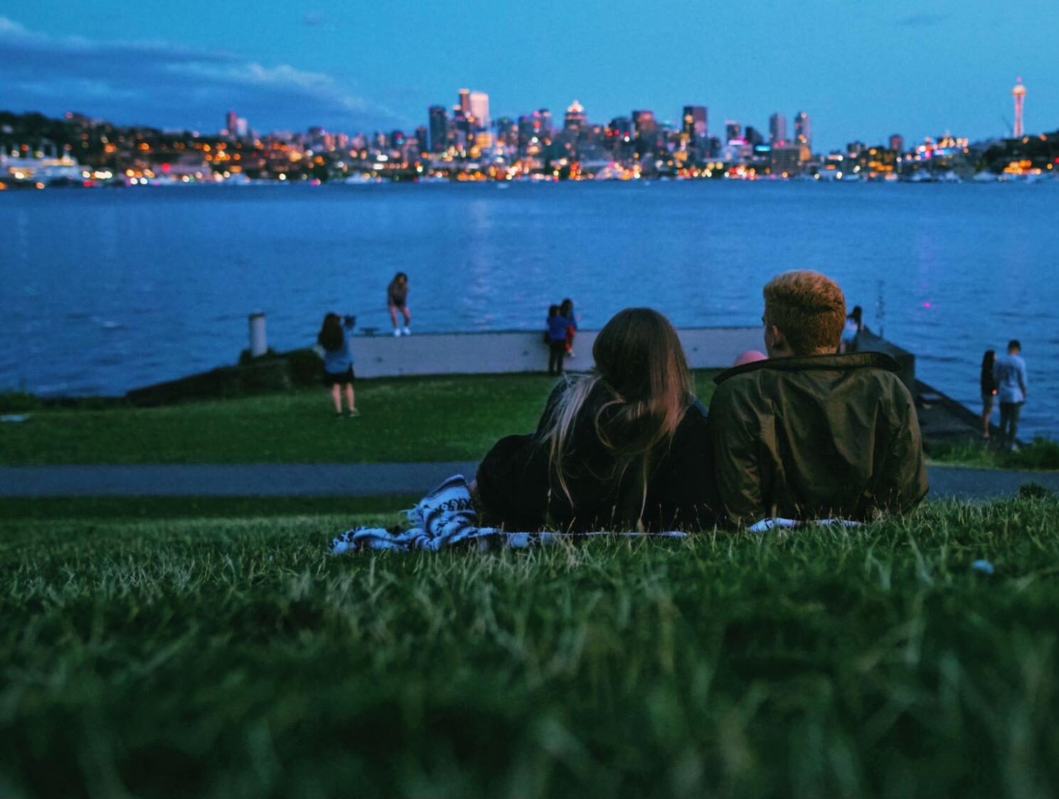 Couple looks over the city of Seattle