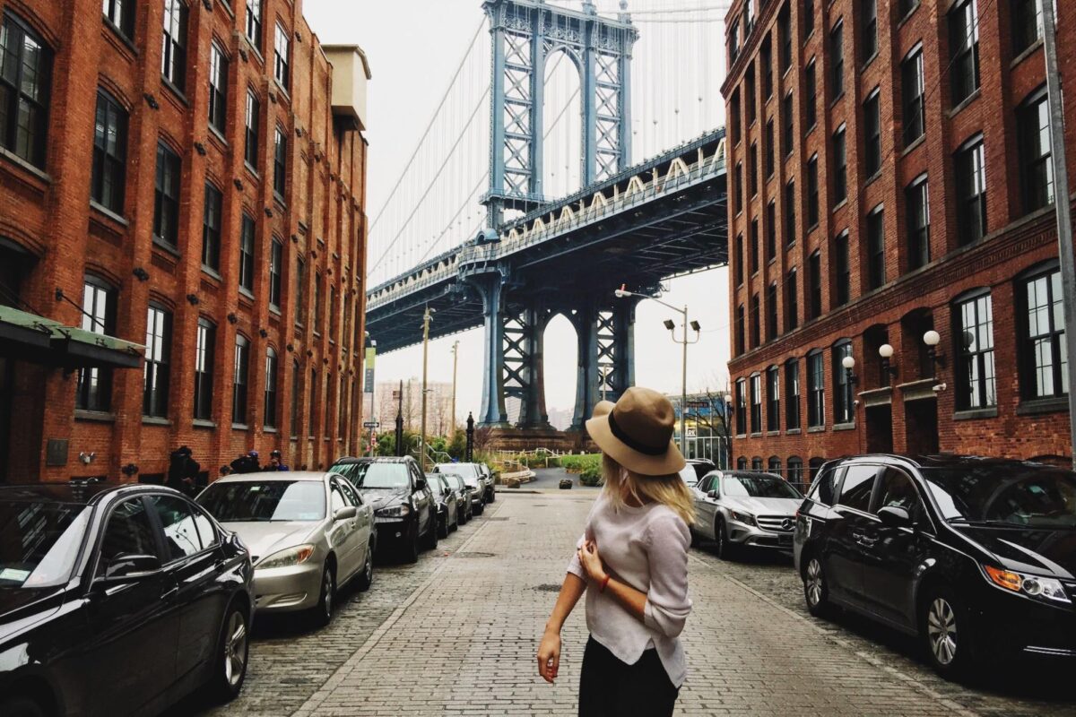 A woman looks at a view of New York City