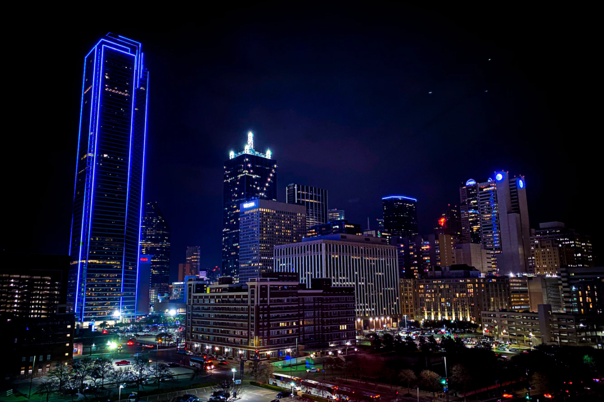 An aerial view of the skyline in Dallas, Texas at night.