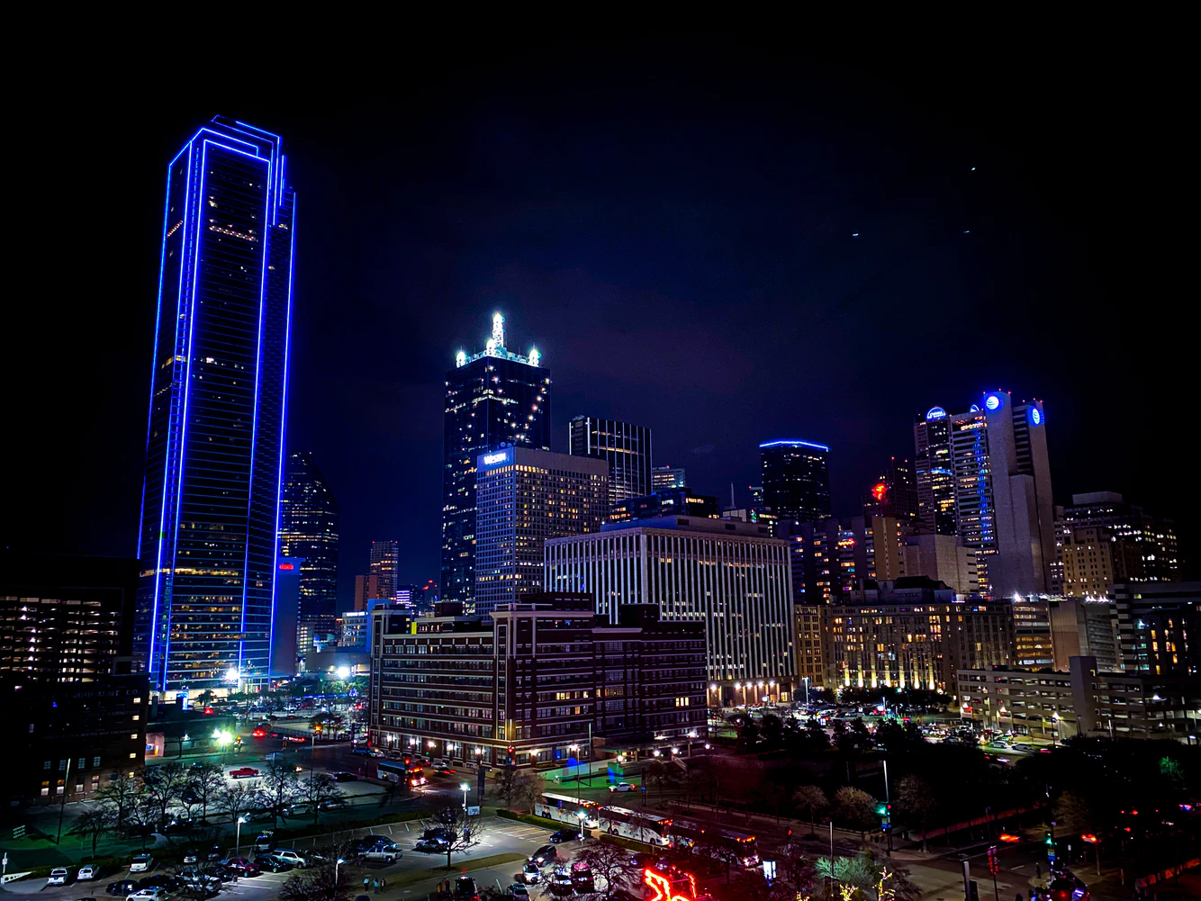 An aerial view of the skyline in Dallas, Texas at night.