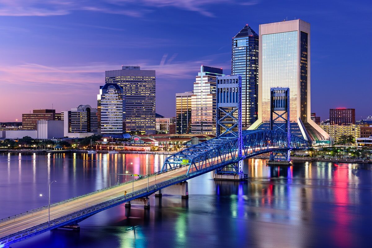 The Jacksonville, Florida, city skyline at night on the St. Johns River.