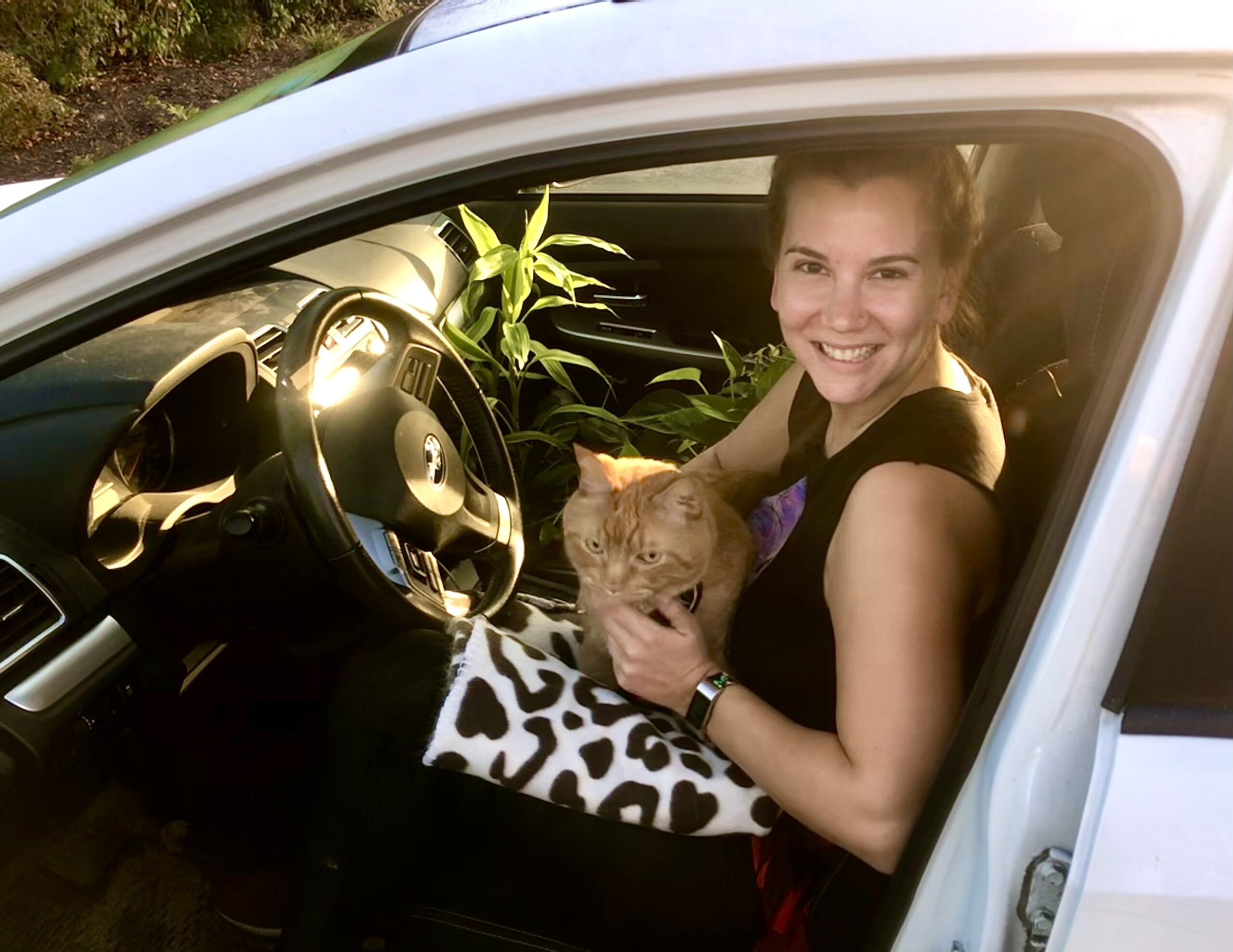 Jess Goudreault prepares to leave for her Landing with her cat, Blink.