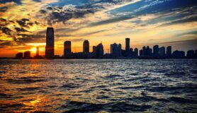 View of Jersey City over the water.