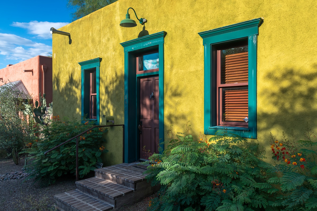 Yellow and green entrance of a home in the Barrio Viejo neighborhood of Tucson, Arizona.