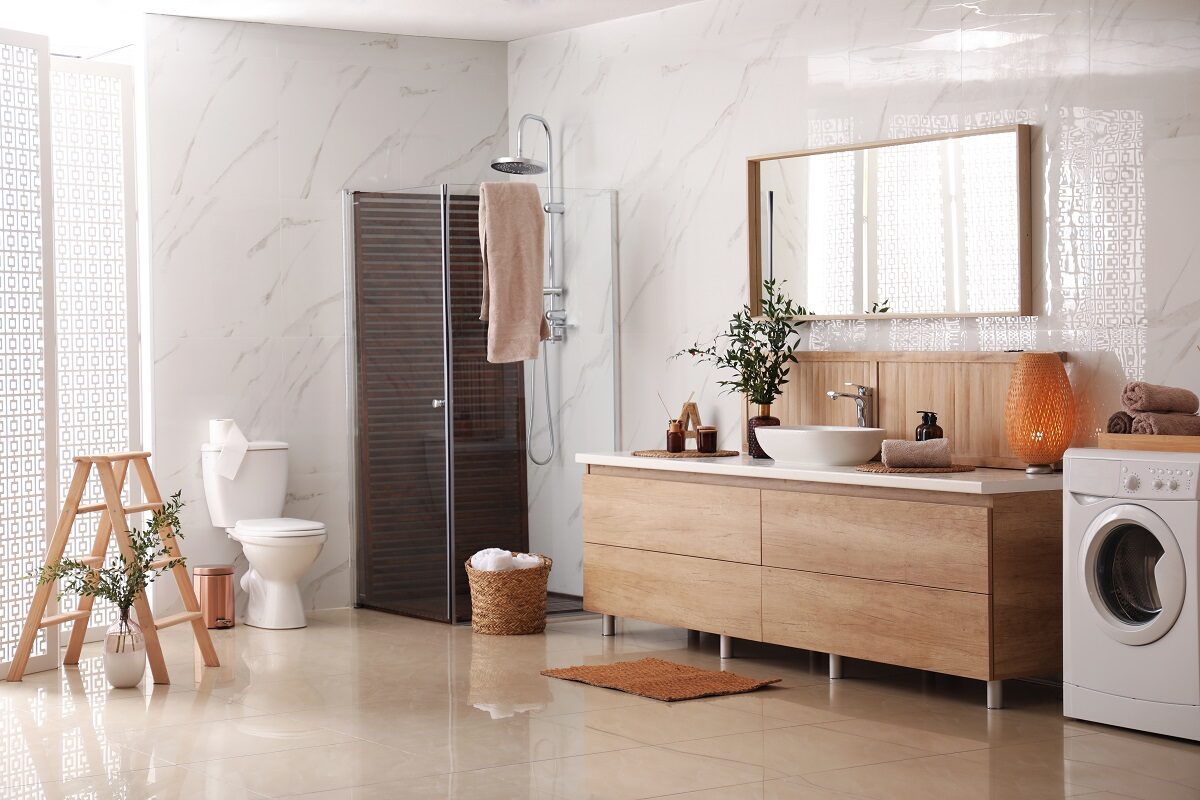 Modern bathroom with in-unit laundry.