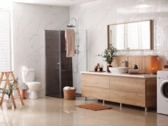 Modern bathroom with in-unit laundry.