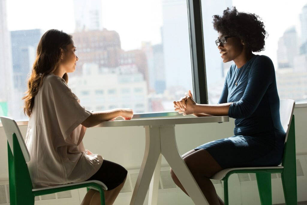 two women negotiating