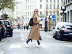 Woman walks to work without a car.