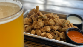 Beer and snacks at one of the best happy hours in Austin.