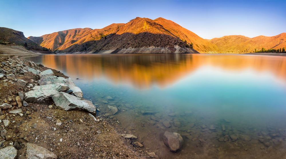 The first light of the sun hits the mountains in Lucky Peak State Park, right outside Boise, Idaho.