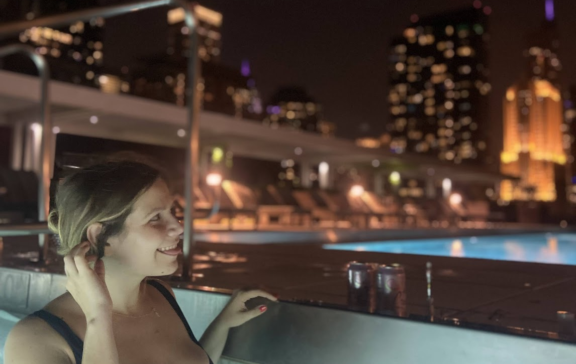 Landing member Becca enjoys a rooftop pool during her time living in Chicago.