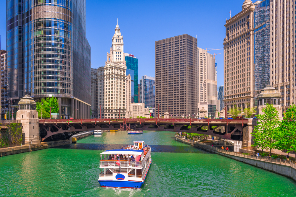 Boat sailing the Chicago River, one of the best outdoor activities in Chicago, Illinois.