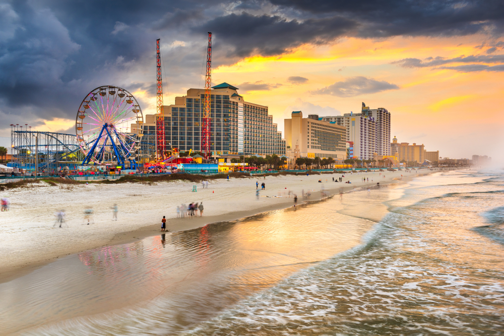 Daytona Beach, Florida, USA beachfront skyline at dusk.