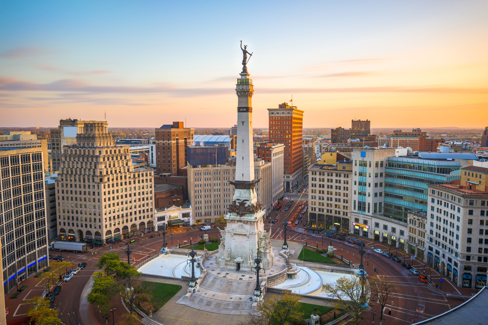 Indianapolis, Indiana, USA skyline over Monument Circle at dusk.