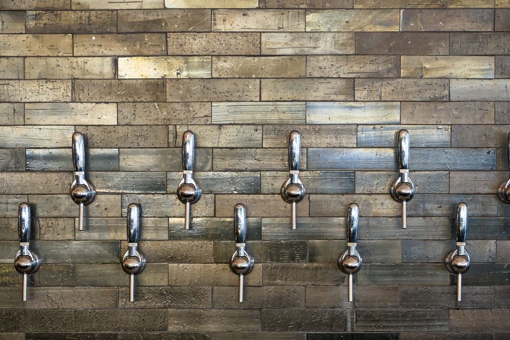 Taphouse in Portland Oregon with multiple tap handles for craft beer and wine.