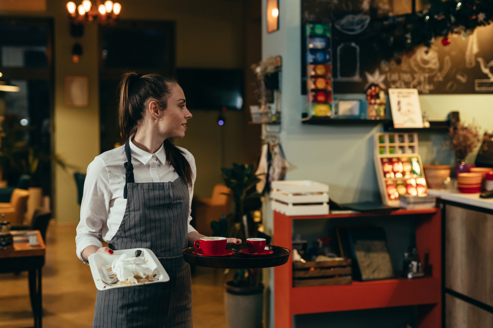 waitress working in cafe or restaurant waitress working in cafe or restaurant