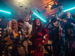 People dancing in a nightclub and enjoying the best nightlife in Charlotte, North Carolina.