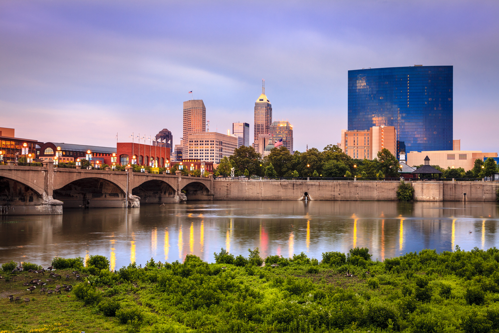 Indianapolis skyline and the White River at sunset Indianapolis skyline and the White River at sunset