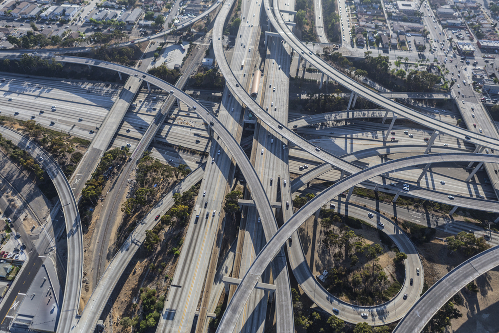 Aerial of the Harbor 110 and Century 105 freeway interchange south of downtown Los Angeles in southern California.