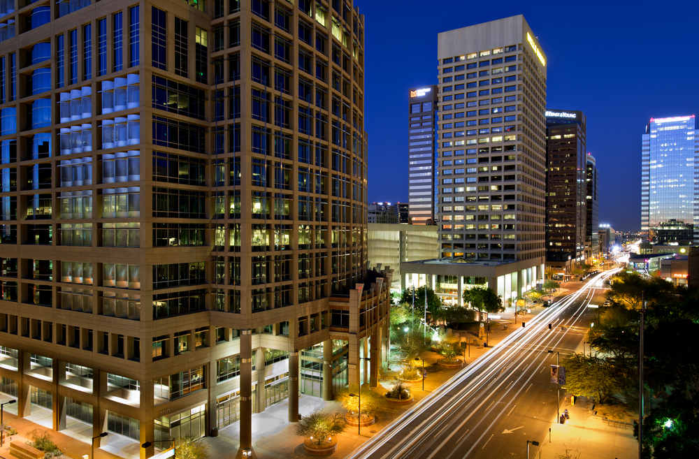 Long exposure photo of the a city street in downtown Phoenix, Arizona at night.