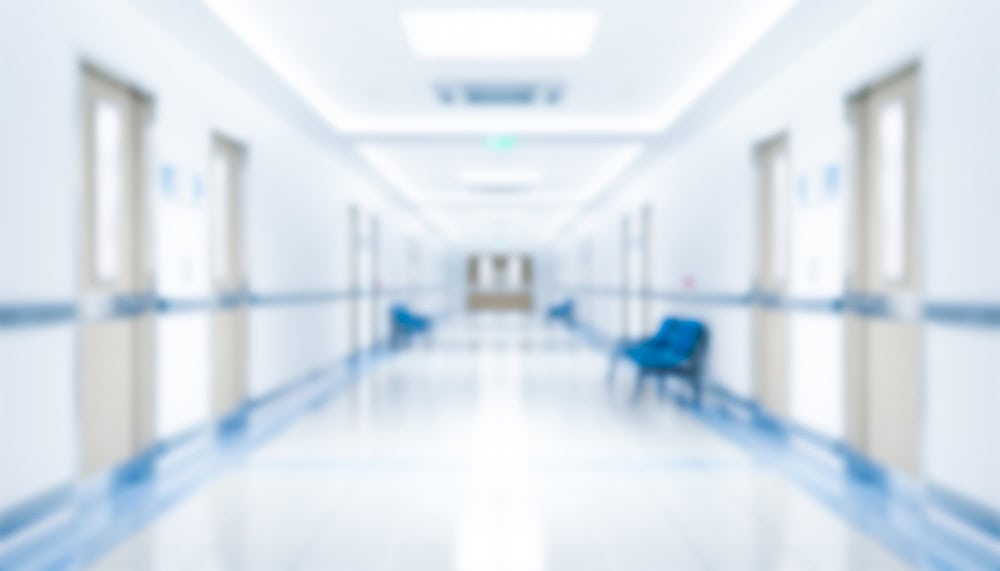 Long hospital bright corridor with rooms and seats 3D rendering