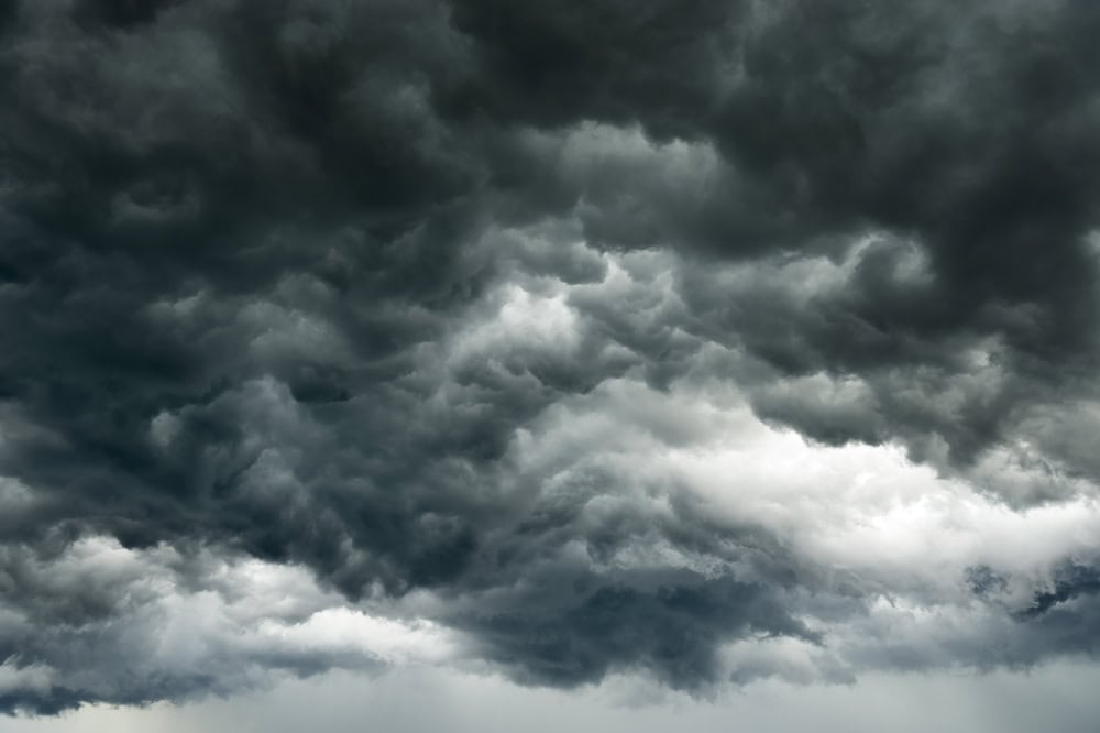 Rain clouds background.Clouds become dark gray like a big smoke before rainfall.Thunderstorm is a storm with lightning and thunder. Air pilots know that they must never fly through a thunder cloud. 