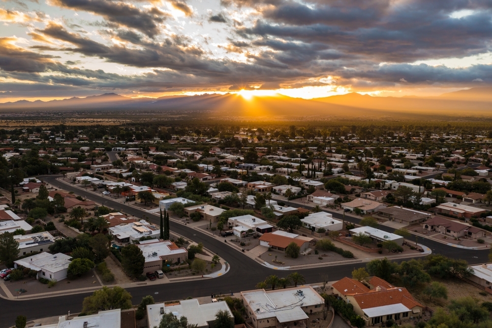Scenic view of Green Valley Arizona during sunrise with sun rays and clouds. Scenic view of Green Valley Arizona during sunrise with sun rays and clouds.