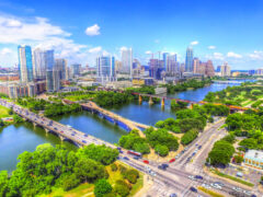 The Austin skyline is surrounded by lush greenery