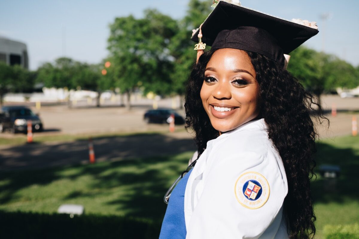 Graduate student wearing a graduation cap.