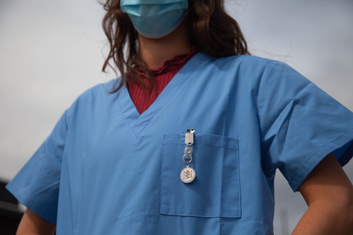 Travel nurse wearing scrubs