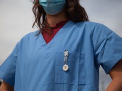 Travel nurse wearing scrubs