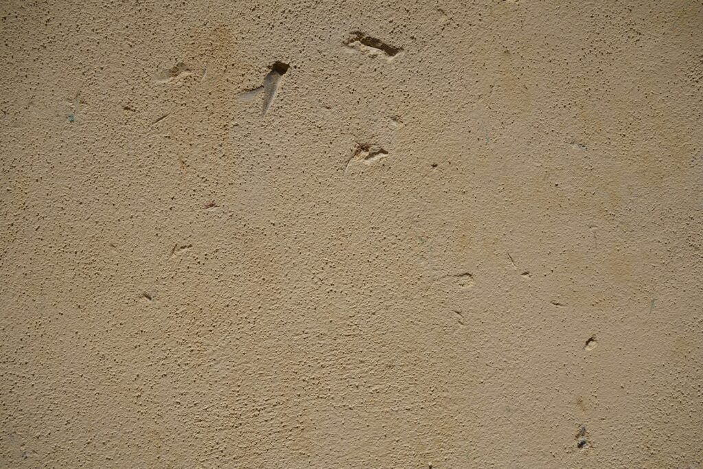 Wall with scratches, holes and damages