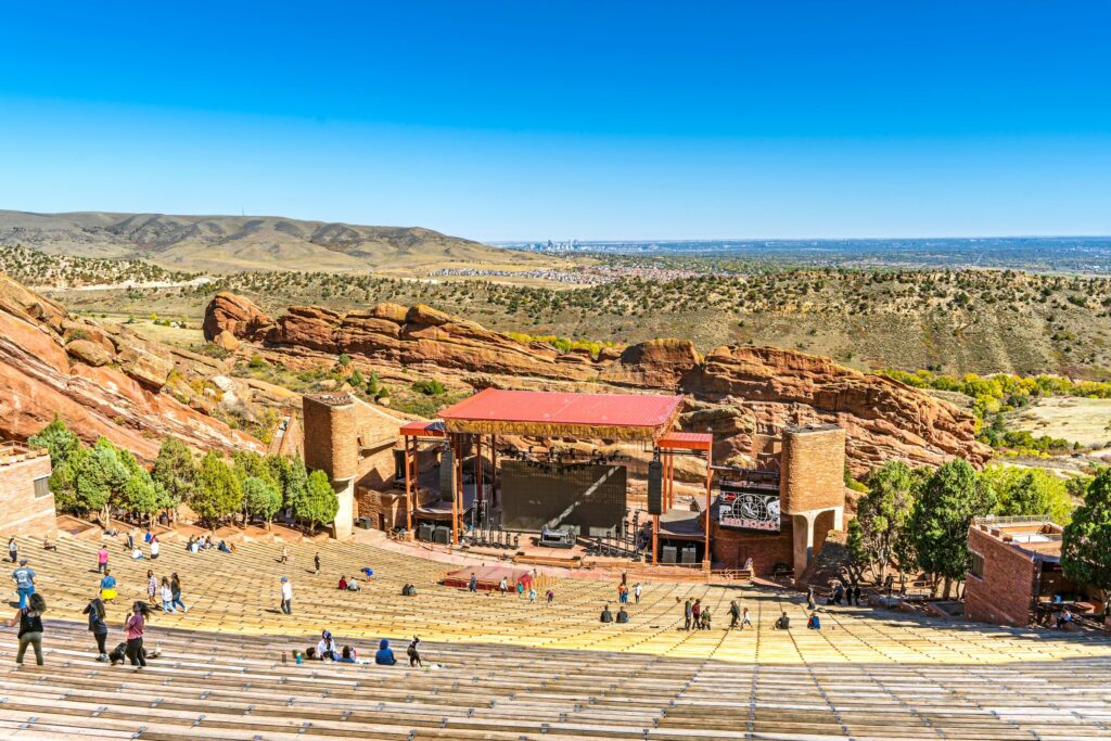 Red Rocks Park and Amphitheater captured from the top looking out onto the horizon with the stage centered.