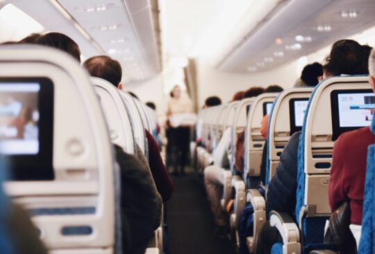 View of airplane aisle and seats