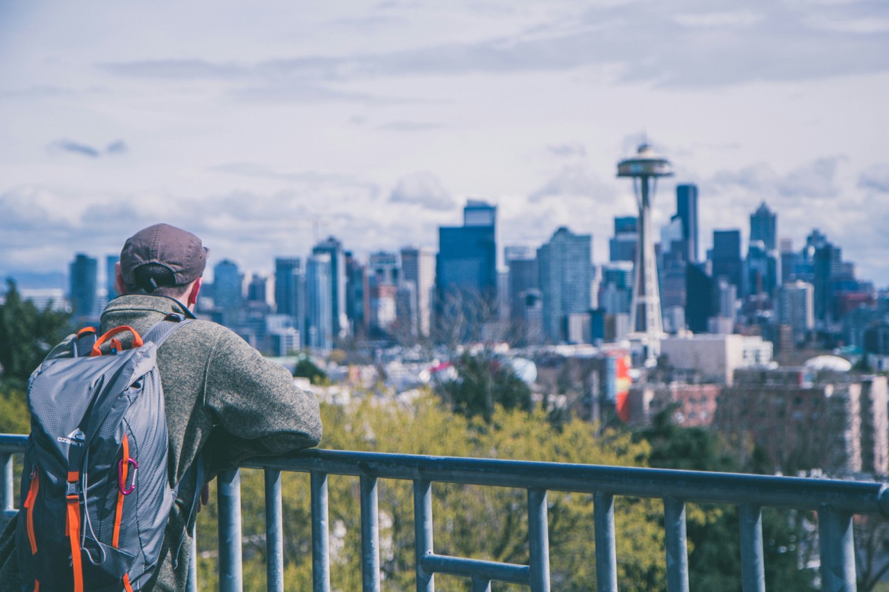 Man outdoors in Seattle overlooking Space Needle