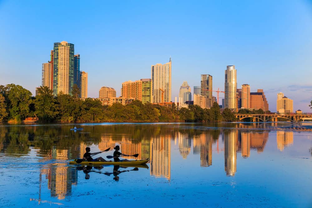 Couple kayaking on the Colorado River in Austin