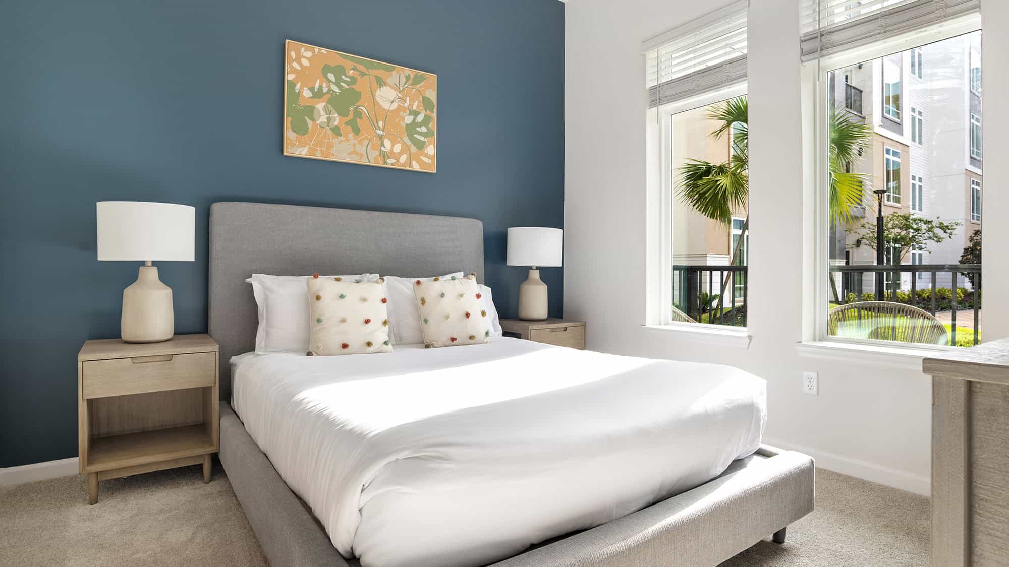 Cozy bedroom apartment in Orlando, FL with tropical decorations.