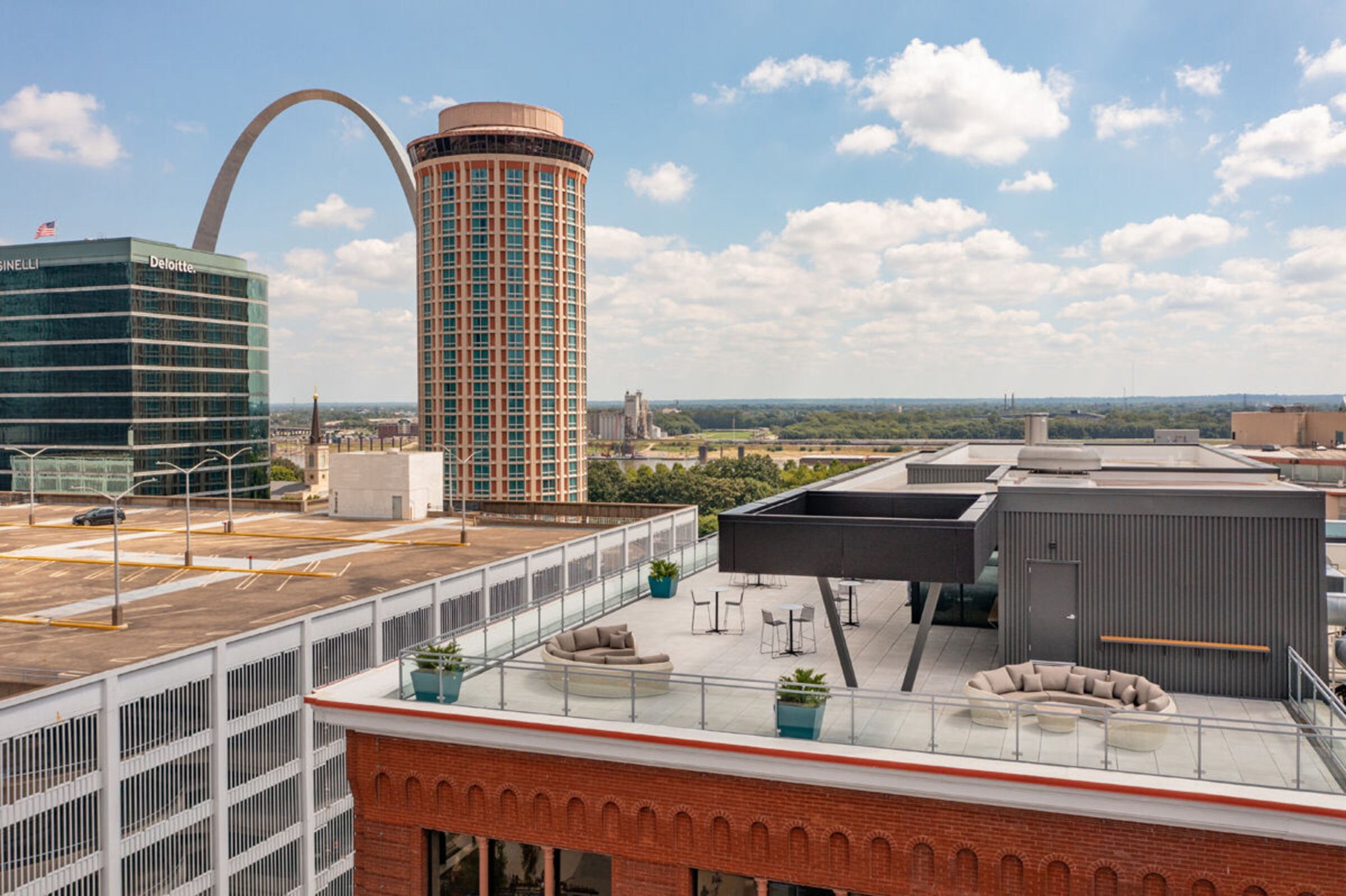Rooftop lounge at Ballpark Heights with views of the Gateway Arch in downtown St. Louis