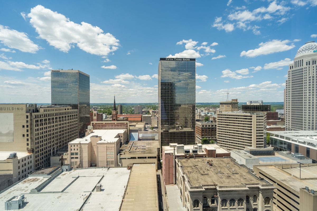 Downtown skyline on a sunny day seen from an apartment rooftop